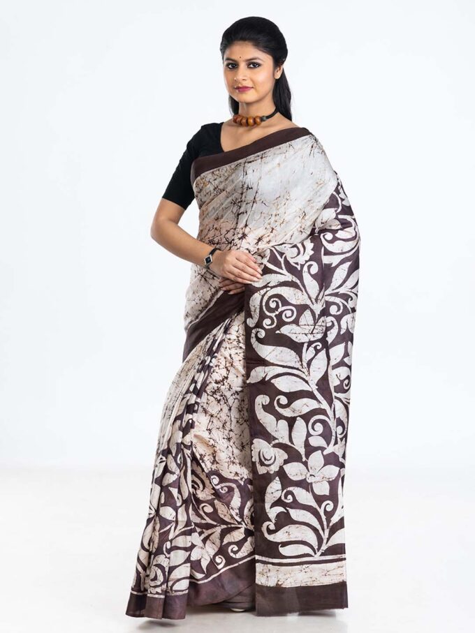 Black and White Saree with Swirls and Traditional Designs