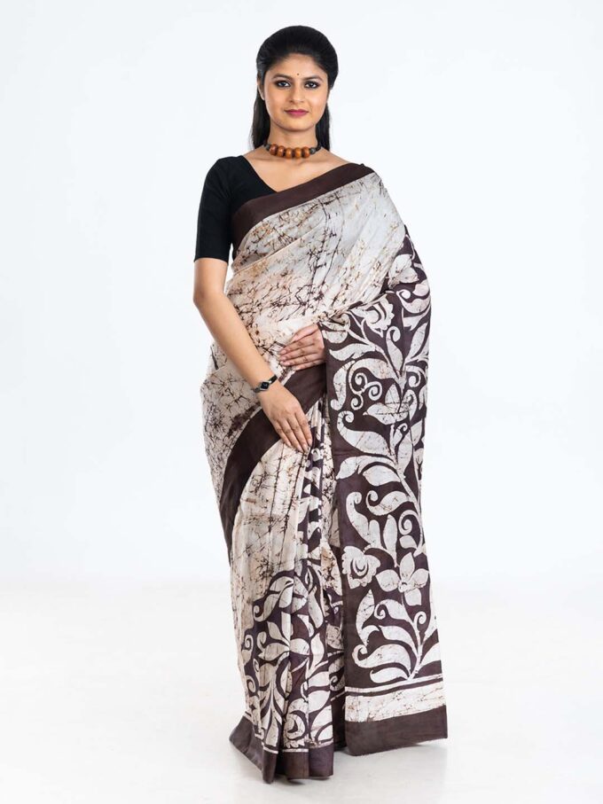 Black and White Saree with Swirls and Traditional Designs