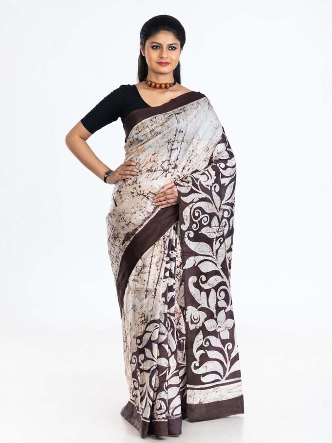 Black and White Saree with Swirls and Traditional Designs