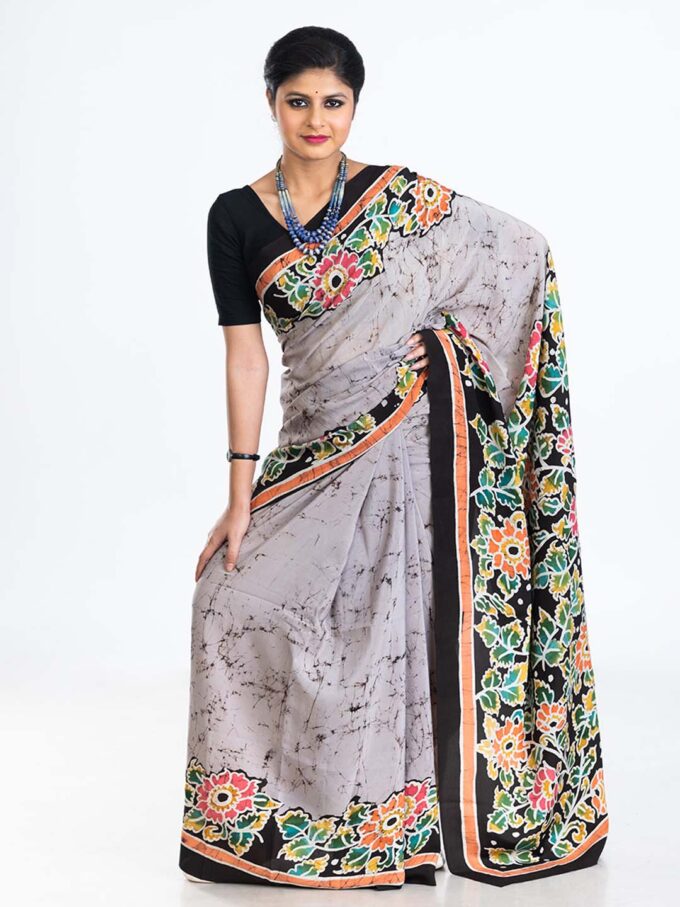 White Batik Crepe Saree With Floral Motifs