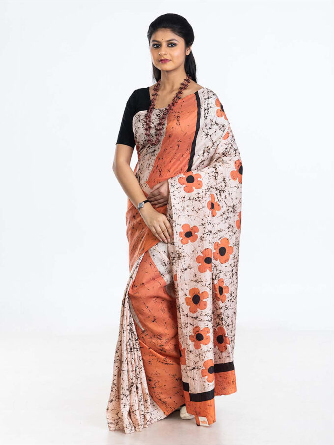 White and Saffron Batik Silk Saree with Floral Patterns