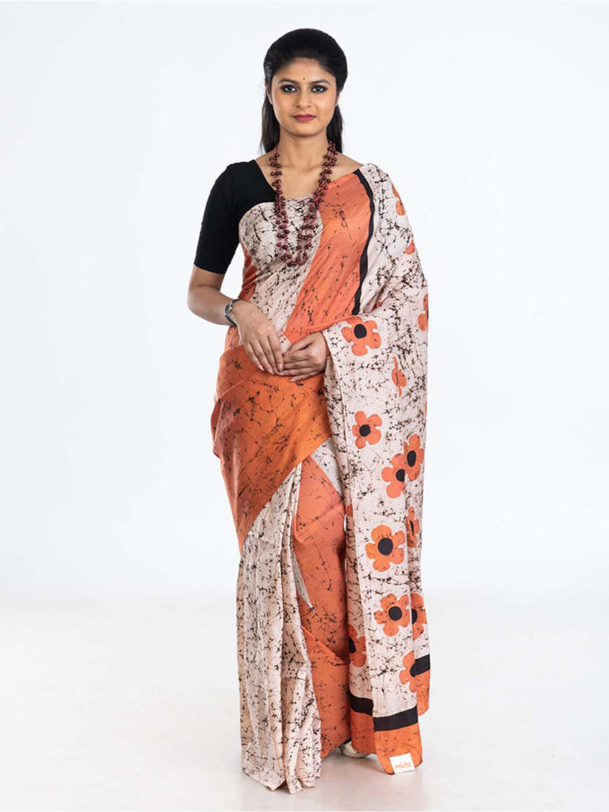 White and Saffron Batik Silk Saree with Floral Patterns