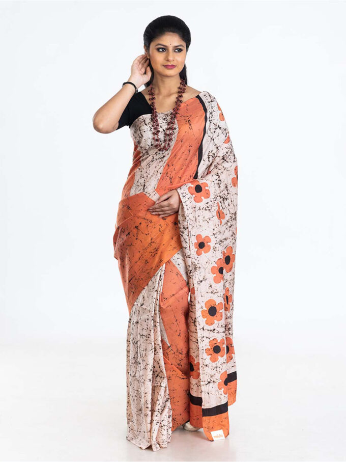 White and Saffron Batik Silk Saree with Floral Patterns